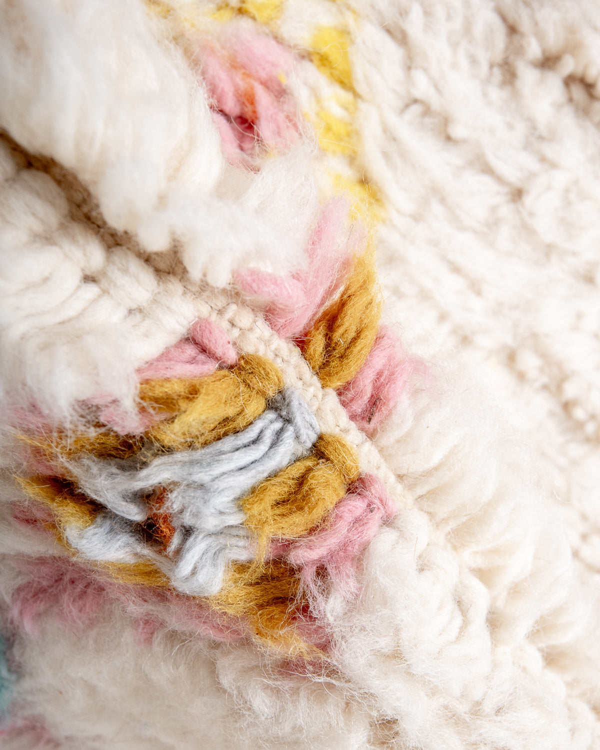 Modern, designer, handcrafted Berber rug from Morocco. Beniourain carpet with beautiful colours and patterns and fluffy wool texture.